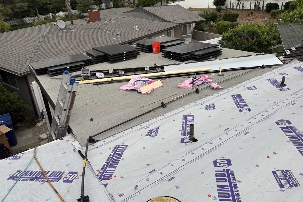 Daylight view of roof underlayment in place before shingle installation.
